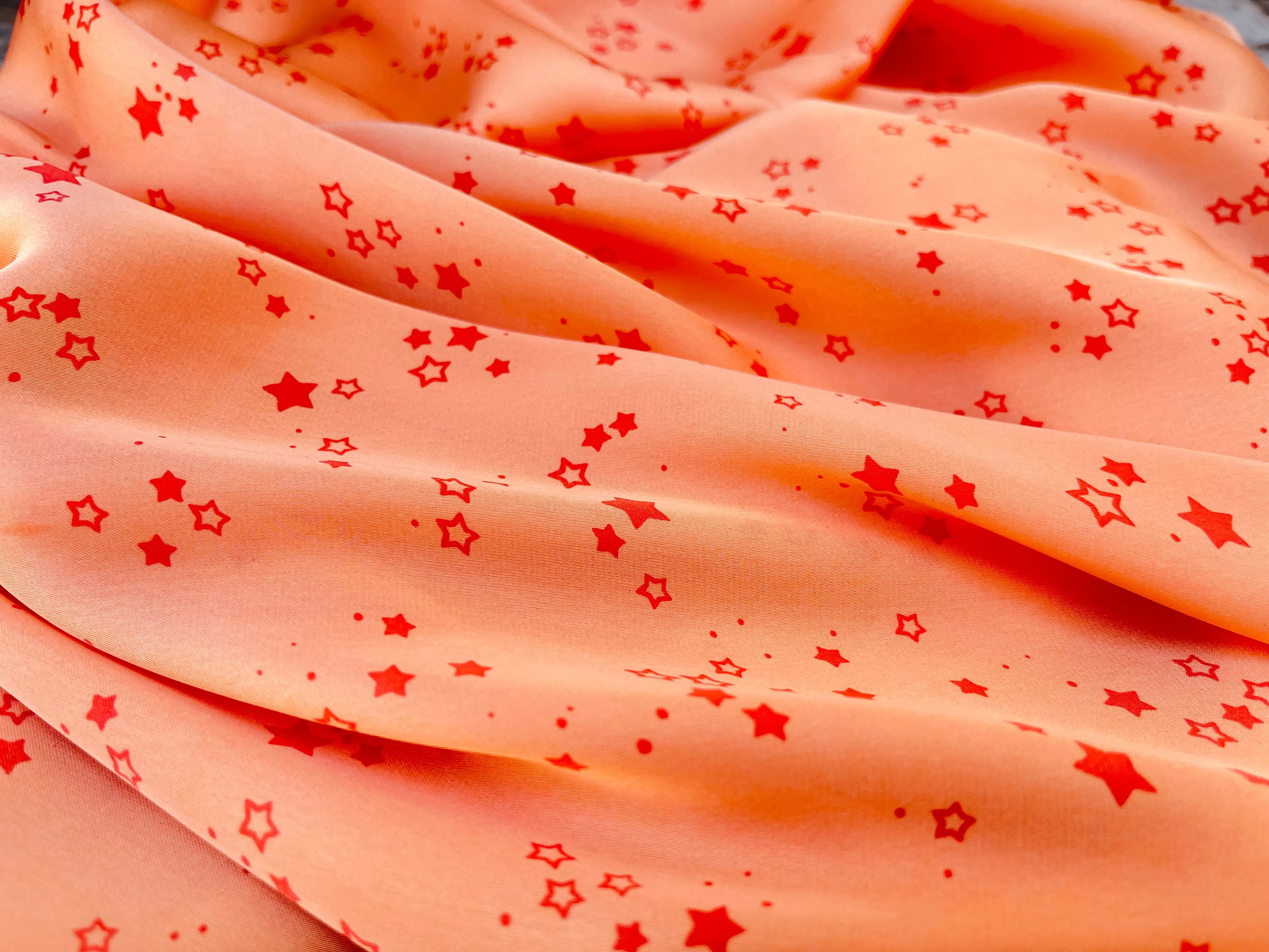 Lightweight  satin  fabric by the yard - Orange Stars  print